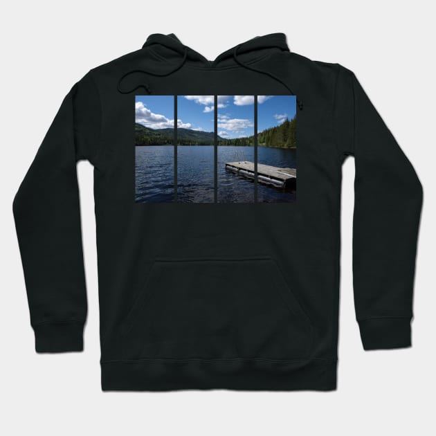 Pad on a wooden floating platform. Metal ladder to get out of the water of a beautiful fjord in Norway. Rippled sea. Sunny spring day. No people Hoodie by fabbroni-art